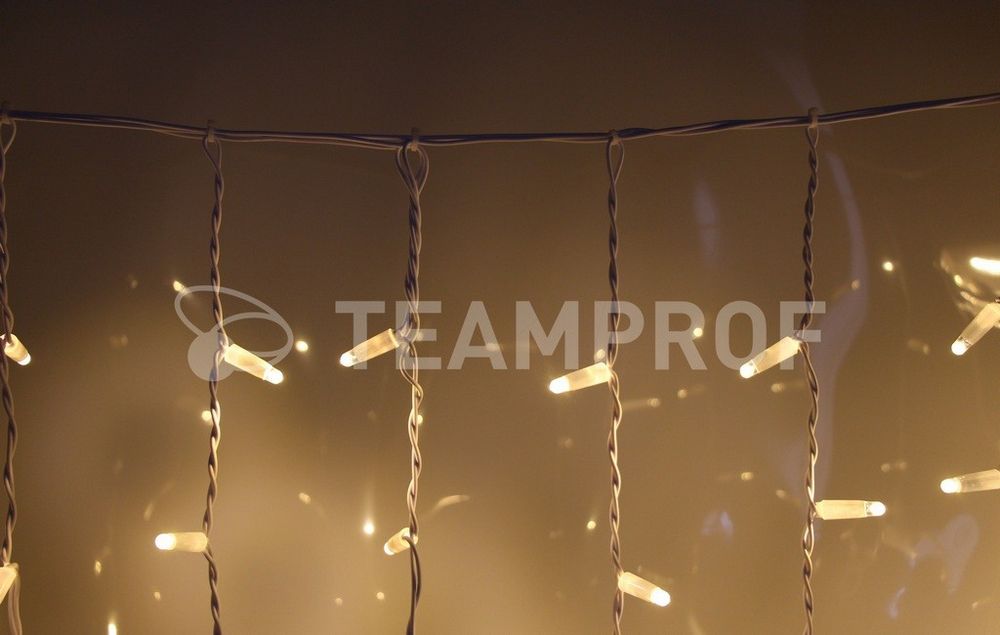 Светодиодный занавес Teamprof 2х1.5м, статика, белый провод, теплый белый Качественная картинка Светодиодный занавес Teamprof 2х1.5м, статика, белый провод, теплый белый