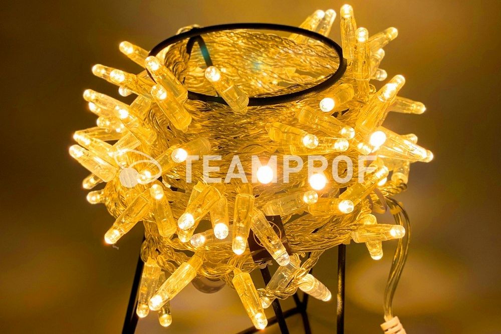 Качественная картинка Светодиодная гирлянда нить Teamprof, 10м, 100 LED, 24В, статика, прозр. провод, герм.колп., желтый