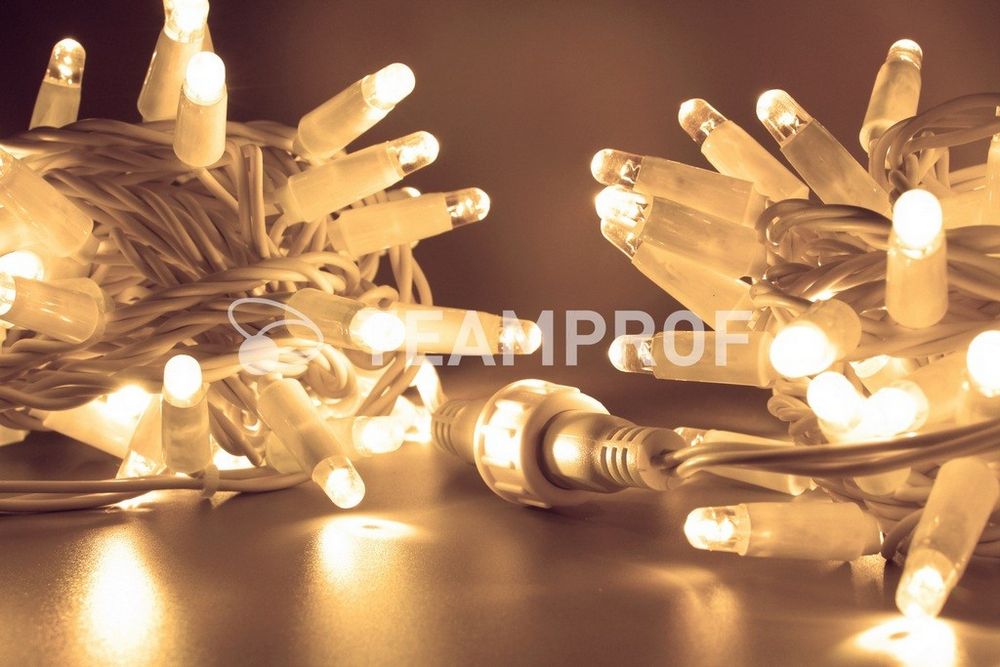 Качественная картинка Светодиодная гирлянда нить TeamProf 10 м, 100 LED, 220В, мерцание, белый пр, тепл. белый