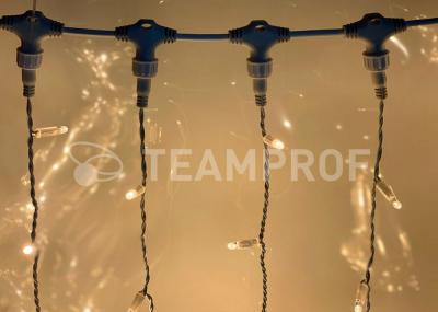 Светодиодный занавес Teamprof 2х6м, статика, черный провод, теплый белый Светодиодный занавес Teamprof 2х6м, статика, черный провод, теплый белый