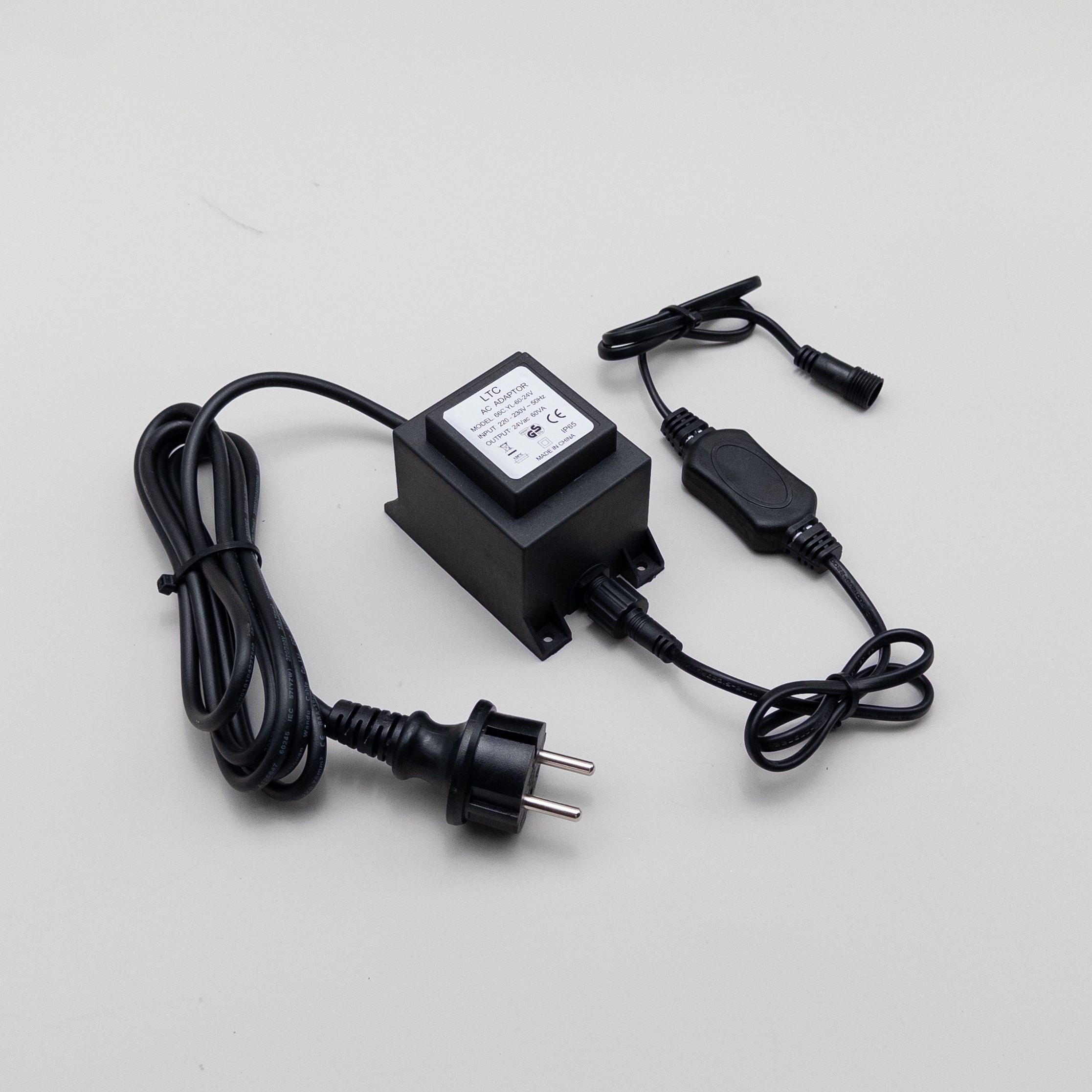 Качественная картинка Трансформатор Laitcom 60W с выпрямителем, 24V (до 1000 LED) Каучук, IP65