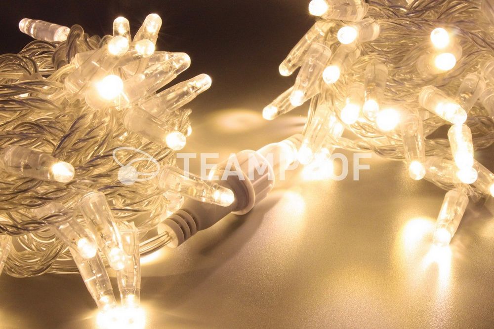 Качественная картинка Светодиодная гирлянда нить TeamProf 10 м, 100 LED, 220В, мерцание, гермет.колп., прозр.пр.,теп белый