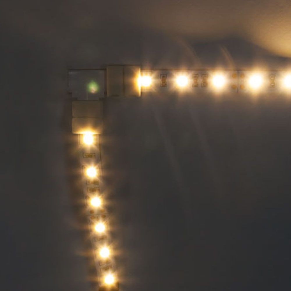 Качественная картинка Комплект L коннекторов с соединителем для светодиодной ленты Feron (2835/8мм), LD184