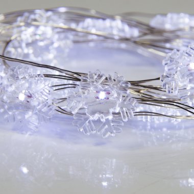 Качественная картинка Светодиодная гирлянда Роса Снежинки Neon-Night, 2м, 20 LED, ПВХ, IP20, 2хCR2032 (есть), белый