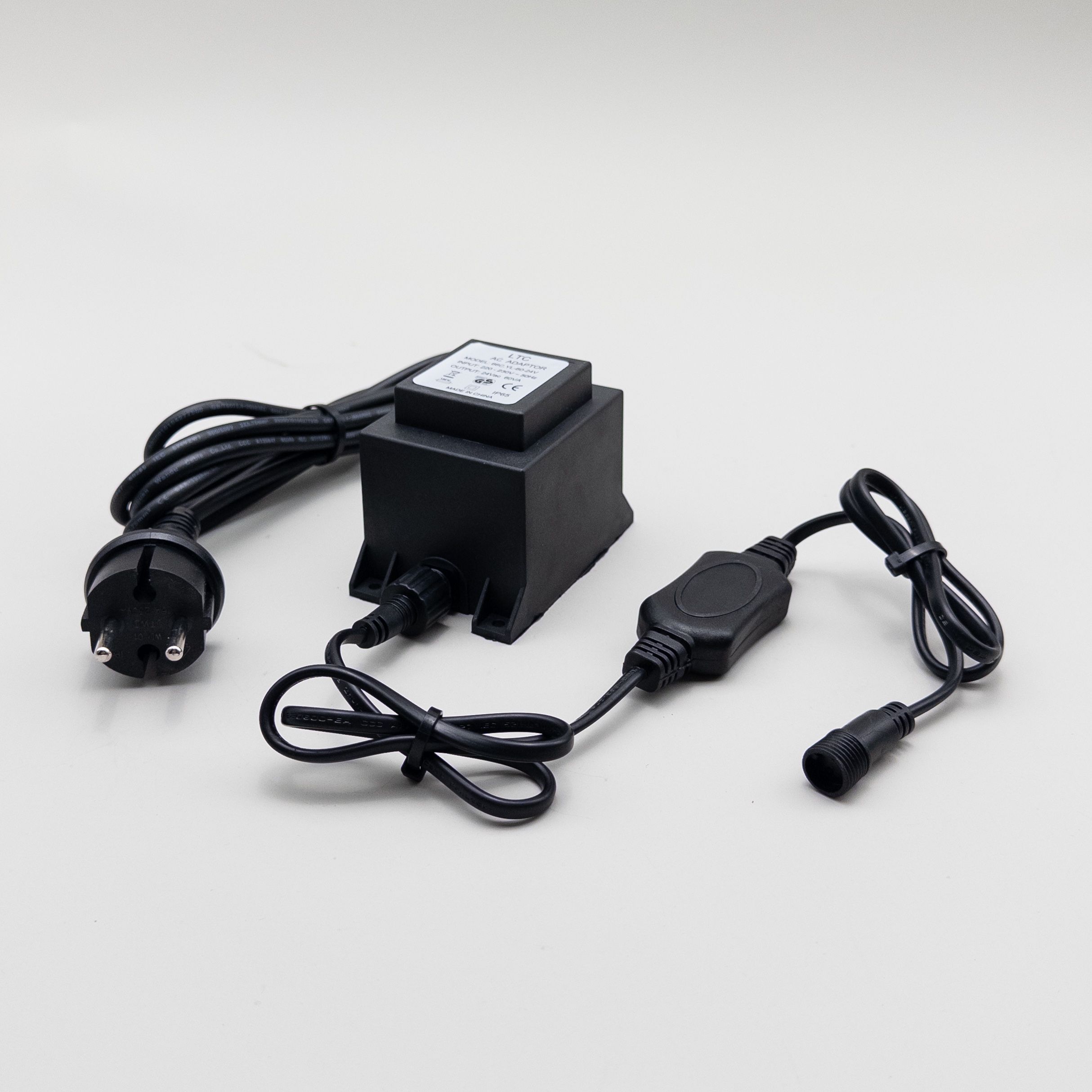 Качественная картинка Трансформатор Laitcom 60W с выпрямителем, 24V (до 1000 LED) Каучук, IP65